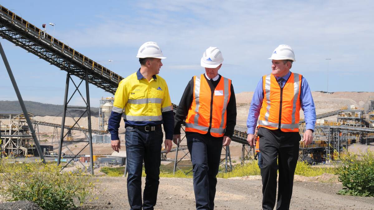 BLUE skies ahead: Whitehaven Coal managing director and chief executive officer Paul Flynn (left) with Member for Parkes Mark Coulton and Federal Minister for Industry and Science Ian Macfarlane at the official
opening of Maules Creek Mine in September.