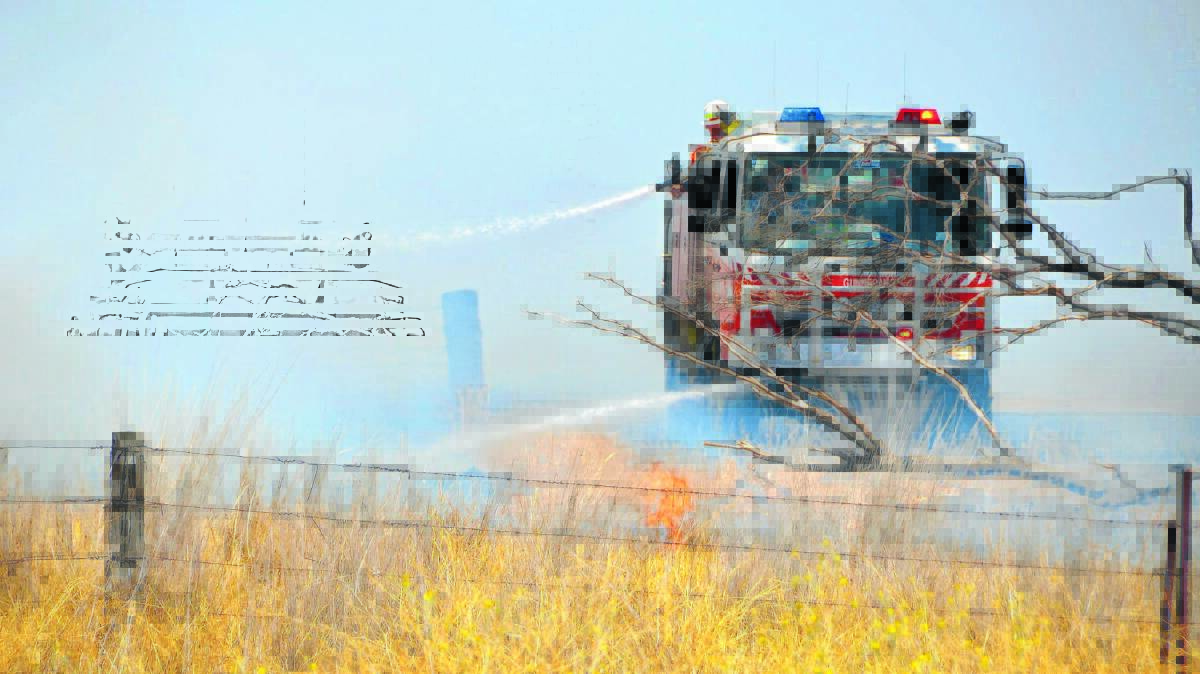 Firefighters battle a fire at Carroll late last year.
