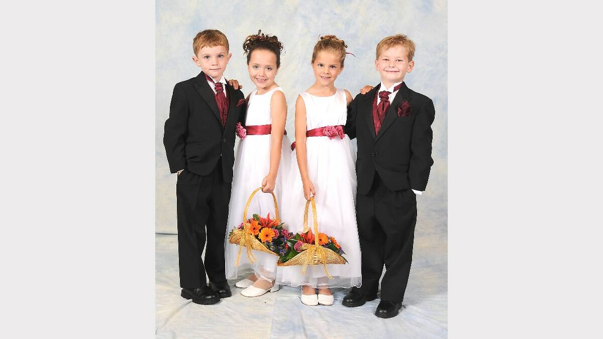 Flowergirls and pageboys, Kaleb McIlveen, Grace McLean, Isabelle Shortis and Caleb Mansfield at the 2009 Catholic Debutante Ball.