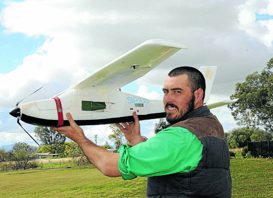 Preparing to launch. Gunnedah surveyor Lincoln Stewart with one of only a few Unmanned Aerial Systems (UAS) light surveying aircraft that is operating in NSW.