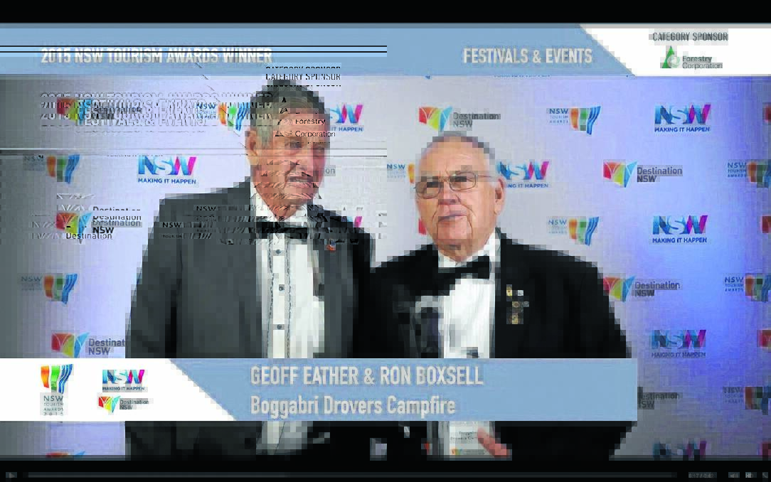 Boggabri’s Geoff Eather and Ron Boxsell with the NSW Tourism Awards trophy in December 2015.