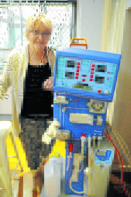 Home treatment: Tracey Roberts with the haemodialysis machine she has been using at home until recently.