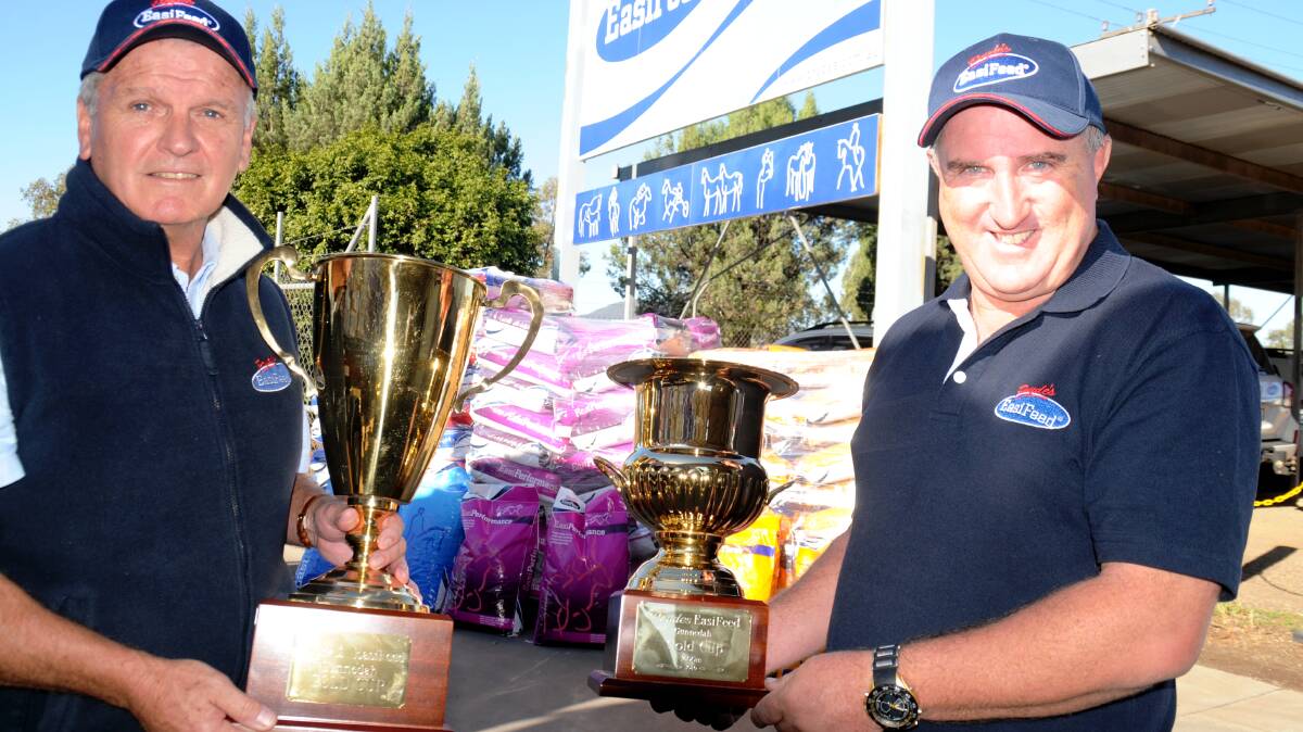 Race day major sponsor Peter Pryde from Pryde’s EasiFeed and Gunnedah Jockey Club secretary manager Mark Storey with the perpetual trophy and 2016 Gold Cup in the lead up to this weekend’s Mother’s Day race meet at Riverside Racecourse in Gunnedah. 