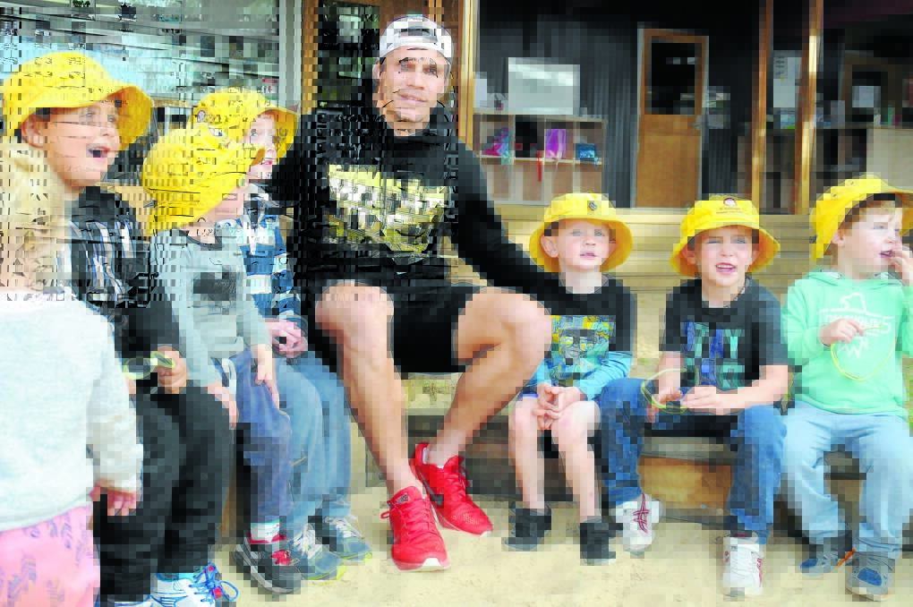 NRL superstar James Roberts dropped in to Winanga-Li Aboriginal Child and Family Centre on Wednesday afternoon to meet some of the kids and staff before flying back to Brisbane. 