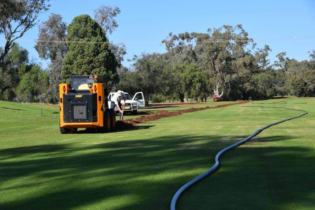 A new watering system on the Gunnedah golf course includes 600 sprinkers on the fairways, greens and tees along with piping and connecting wires. 