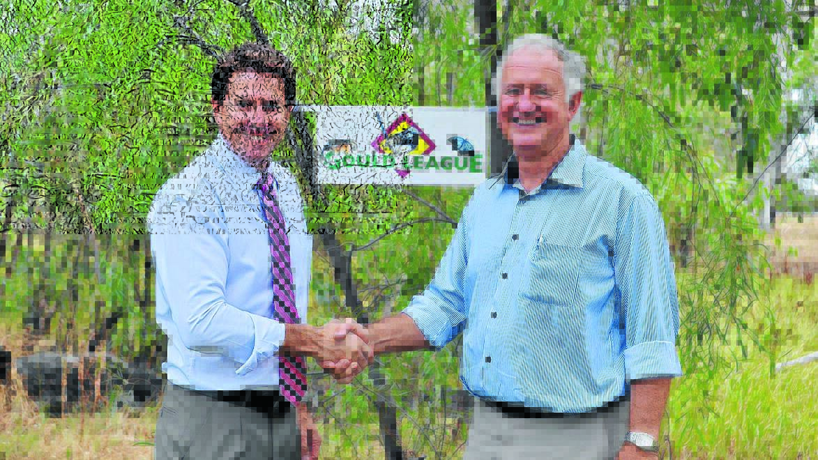 Tamworth MP Kevin Anderson congratulates Gould League managing director David Walker on an NSW Environment Trust grant.