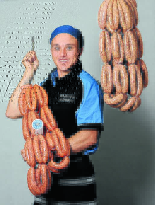 GUNNEDAH’S sausage king, Namoi River Meats butcher Luke Orchard.