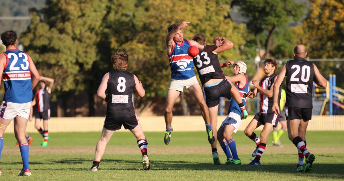 Gunnedah's Al Hillard flies high for the Bulldogs against Inverell in an earlier match this season. He was one of a number of key Bulldogs missing from last weekend's clash against the Nomads. Photo: Sam Woods