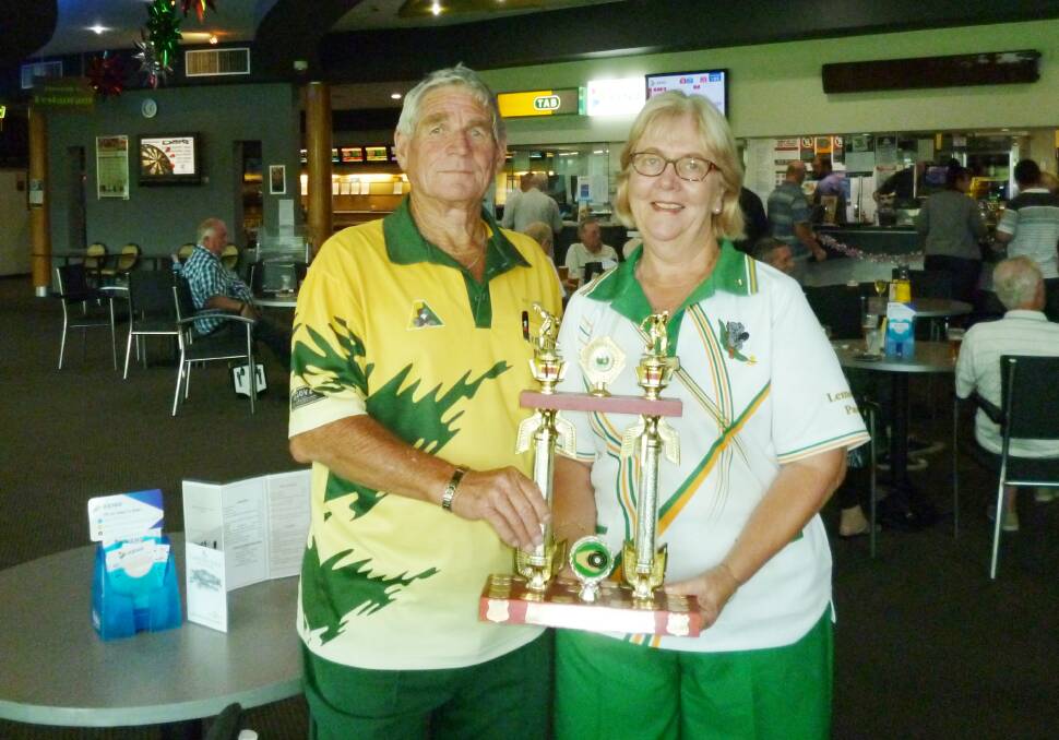 Ray (Clem) Choice and Anne Cheetham after winning the Mixed Pairs Championship.