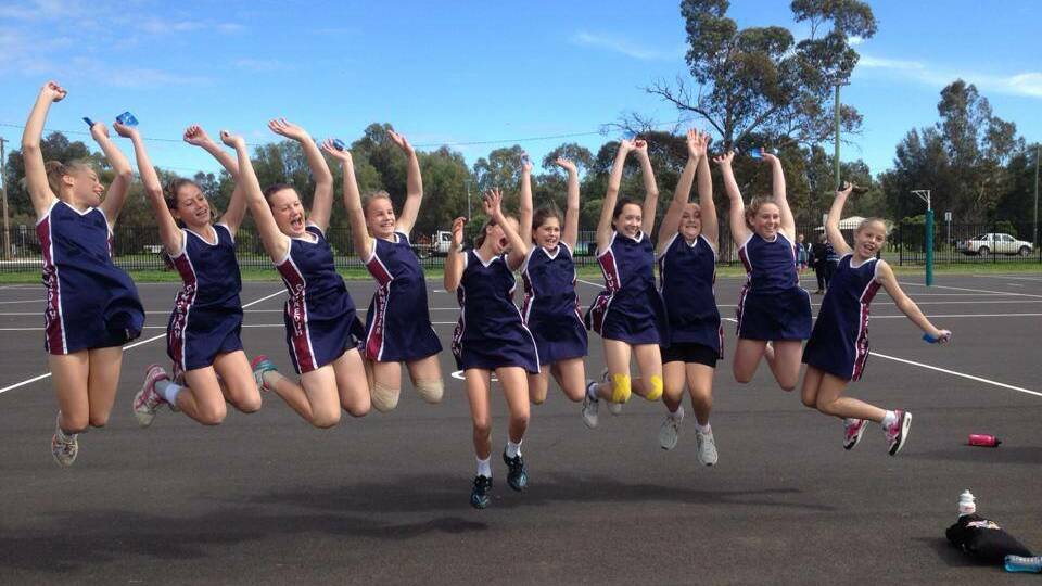 A JUBILANT St Xavier’s netball side after winning the Anne Singleton Cup last Saturday.