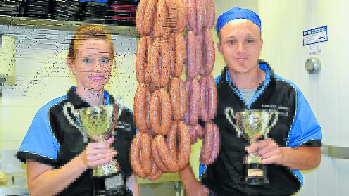 Namoi River Meats owners Eliesha Walker and Luke Orchard with their award-winning sausages.