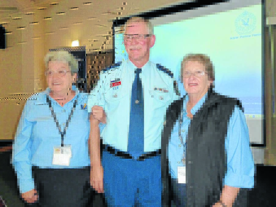 Gunnedah Volunteers in Policing Jill Andrews (left) and Pat Timmins (right) pictured with the manager of the Volunteers in Policing program Inspector Stephen Henkel at a Mudgee conference in 2013. 