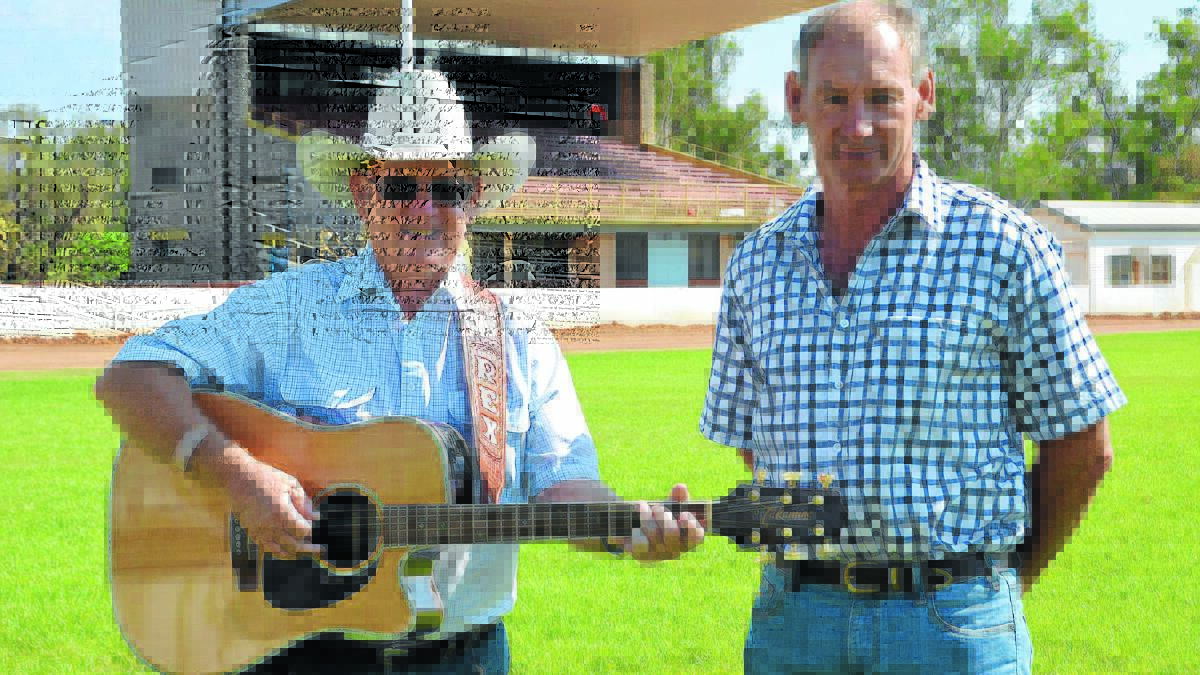 Warming up for the Gunnedah Country Music Muster is bush balladeer Rex Baldwin, pictured with Gunnedah Show Society president Rob Witts.