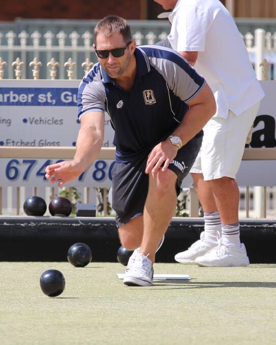 Former NRL star and Men of League (MOL) national welfare manager, Ben Ross, rolls one down at the Gunnedah Bowling Club during the recent MOL charity bowls day in Gunnedah. 