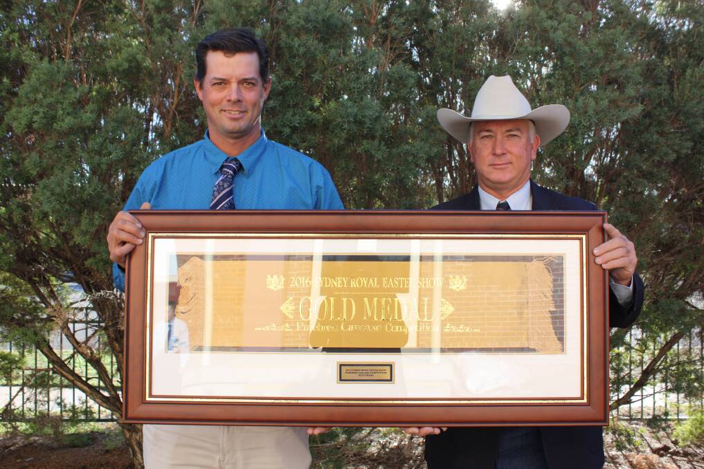Wallawong Murray Greys owner Lachlan James with cattle committee chair of Royal Agricultural Society NSW, Greg Watson. Mr James prepared and jointly exhibited a steer which won a gold medal in the Purebred Open Middleweight competition