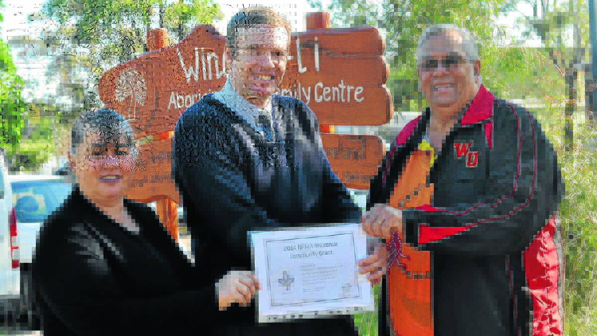 NRMA Insurance Gunnedah representative Donald Whiteman, centre, congratulating Winanga-Li CEO Wayne Griffiths and Winanga-Li Early Learning Centre Director, Leanne Pryor, on receiving a community grant for the centre’s “Feeling Clucky’”project.