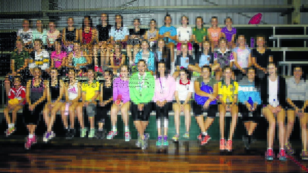 FORMER Australian netball representatives Rebecca Bulley and Natalie von Bertouch (centre) helped run a clinic for local players last Thursday. 