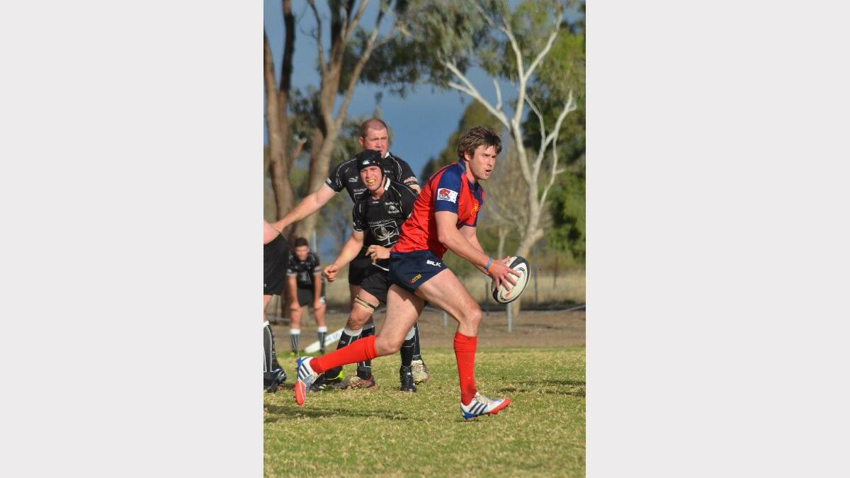 The Red Devils on the fly against Moree on Saturday in their game of the 2014 season. Photo courtesy Moree Champion 