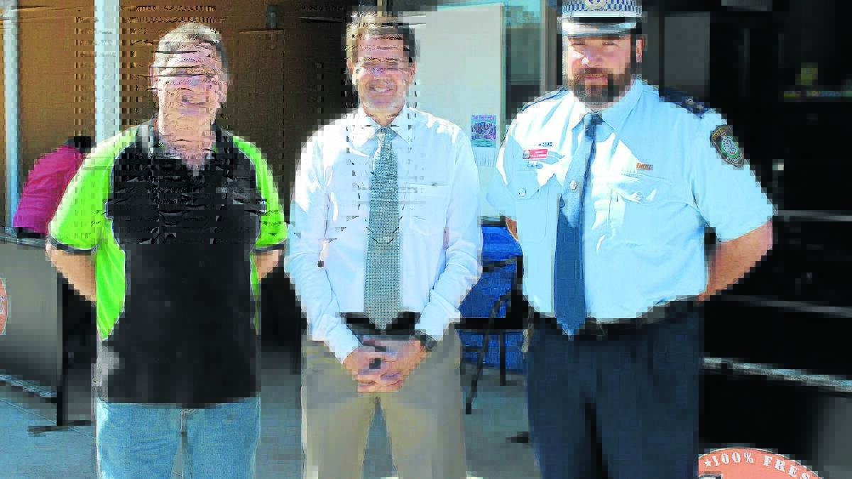 Member for Tamworth Kevin Anderson, centre, met with Gunnedah Duty Inspector Paul Johnson, right, and North Tamworth store owner Barry Bourne in Tamworth yesterday to discuss the ongoing push for a dog squad unit in the Oxley Local Area Command. 