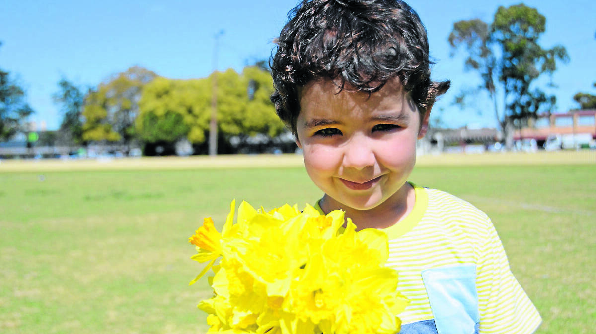 Ollie Tudgey-Hennessy (4) supports Daffodil Day.