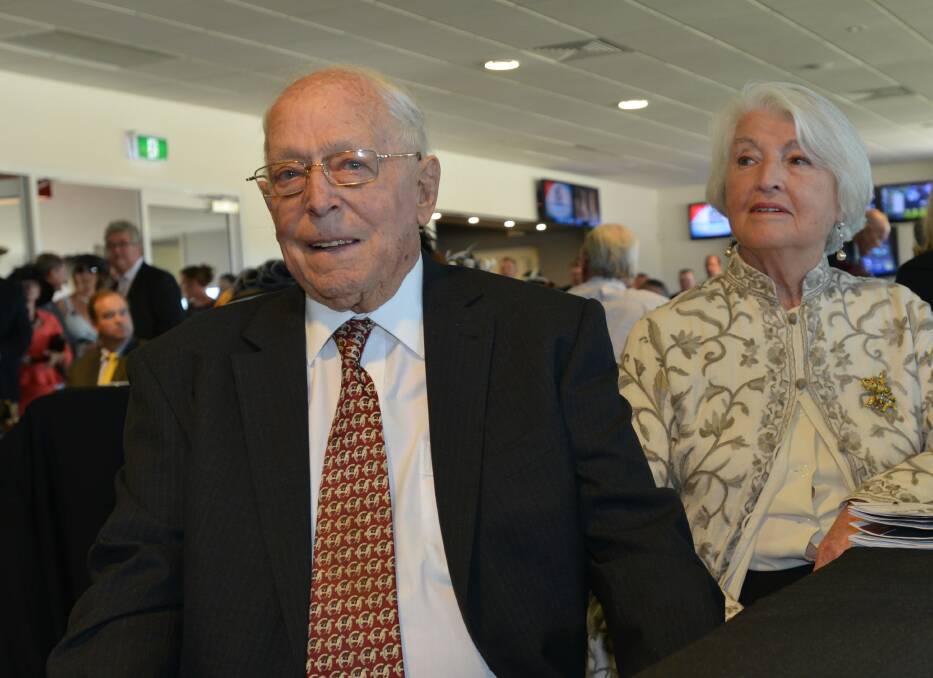 At home at the races: John Clift with friend Mary Clift at the Tamworth track in 2013.