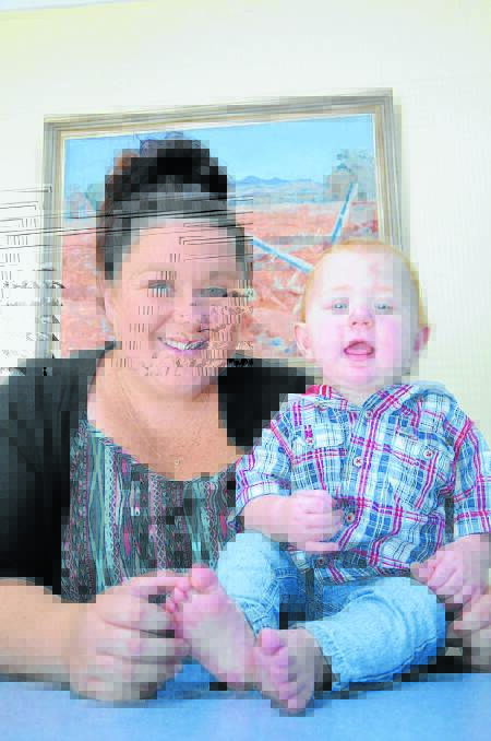 Helping hand: Kayla Miller, pictured here with her son Isaac Cross, has started a new Facebook page.