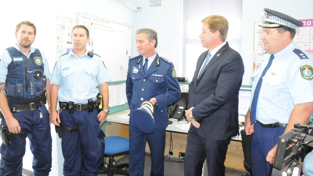 NSW Police Commissioner Andrew Scipione (middle) with Acting Premier and Police Minister Troy Grant (second right), Inspector Paul Johnston (right) and police officers Brian McDougall and Stephen Garrett.