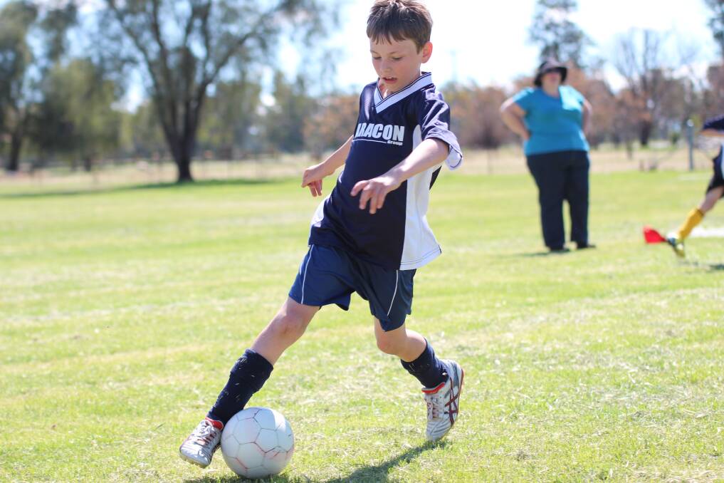 Ben Griffin on the run for the Gunnedah 8/9 years side at the club's recent carnival.