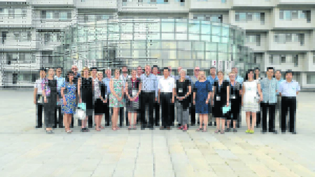 Officials from the Linhe District with representatives from Gunnedah outside the Linhe District Administration building in China.