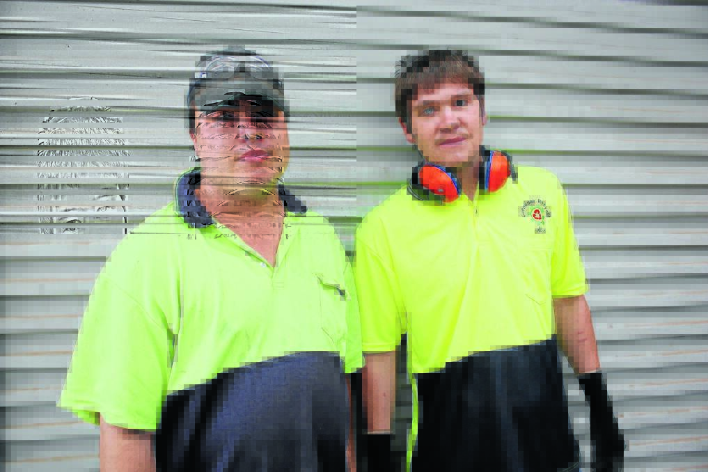 Gunnedah Recyclit workers Luke Agostino and Alex Seach are seeing a dramatic reduction in the number of needles as they sort through the recycling materials.