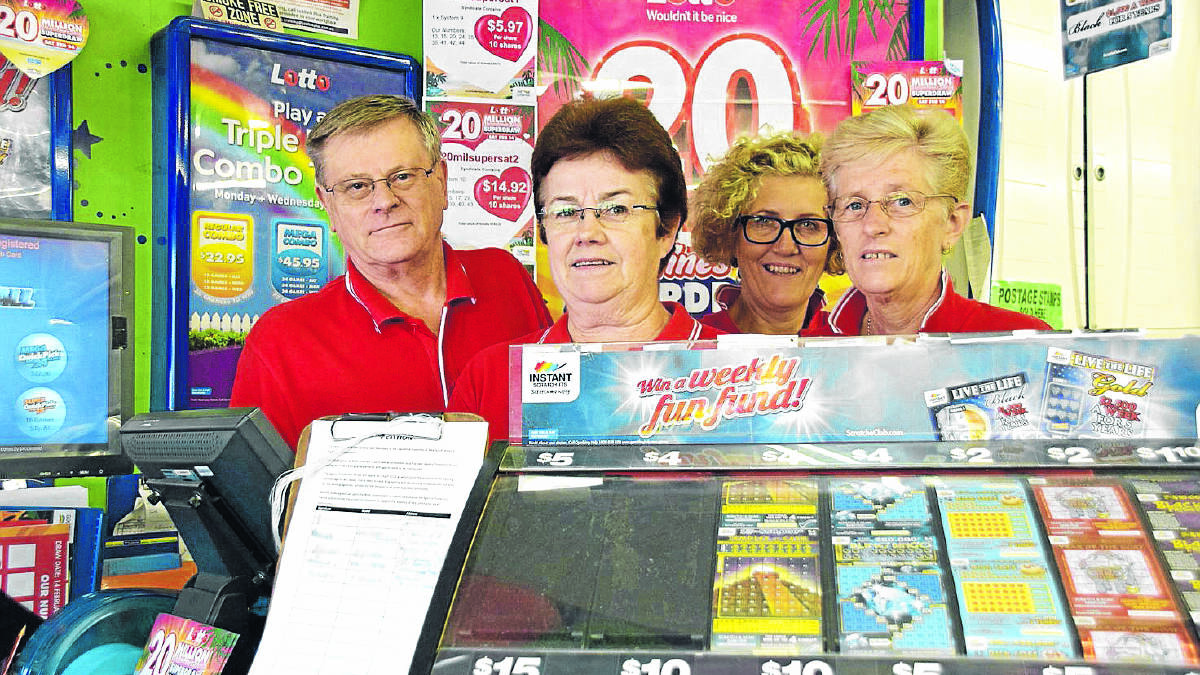 Gunnedah Newsagencies owners John and Ann Sturgess, left, with staff members Jo Smith and Cath Kelly. Pictured in front is a petition which has already attracted thousands of signatures.