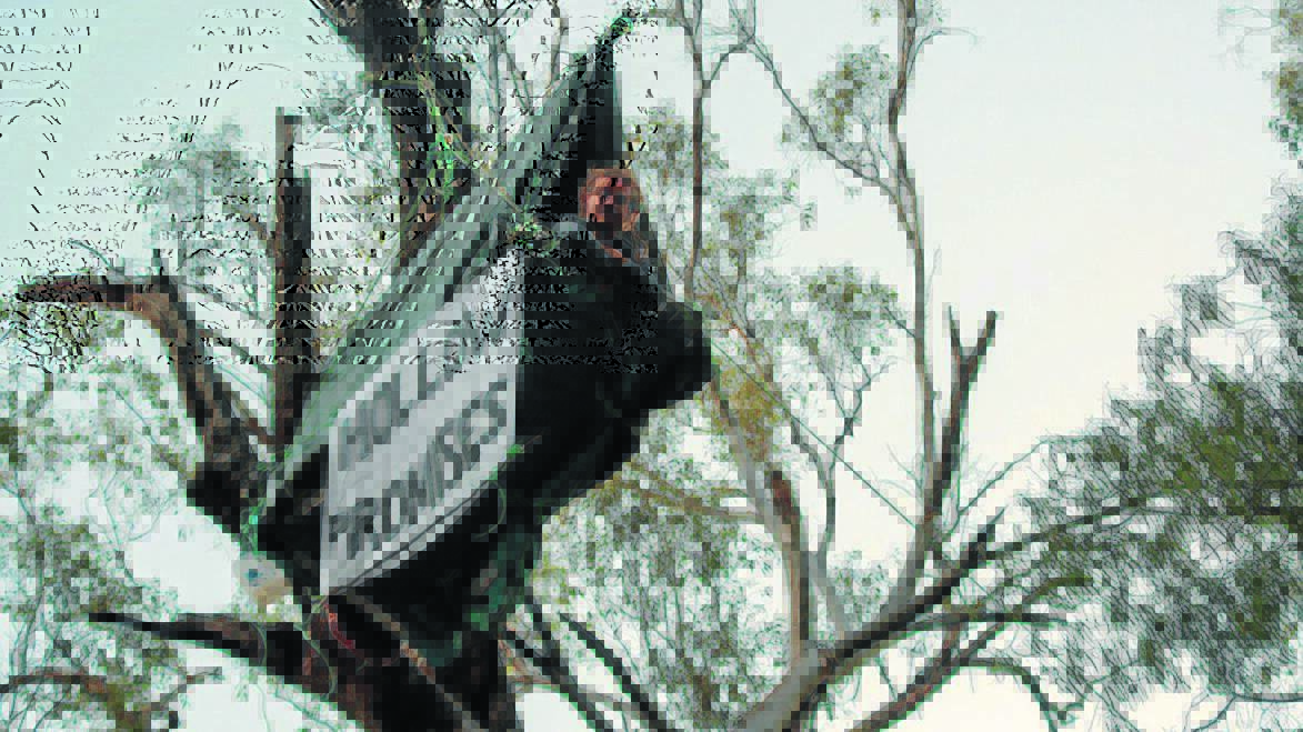 HOLLOW Promises. A man protests against Idemitsu's Boggabri Coal Mine in the Leard State Forest.