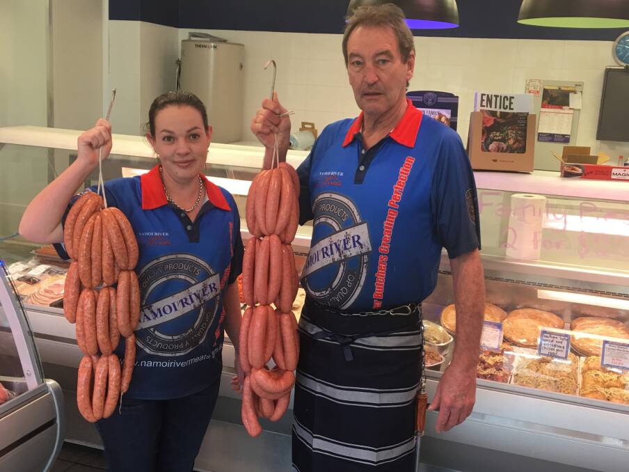 SIZZLING SNAGS: Jeni Kelly and Bill Bree with some of their prized sausages at Namoi River Meats. Photo: Haley Craig