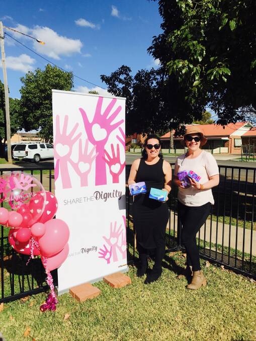 DIGNITY: Kim Banks with Gunnedah business owner Linda Roberts at the Chatterchinos event at the weekend. Photo: Supplied