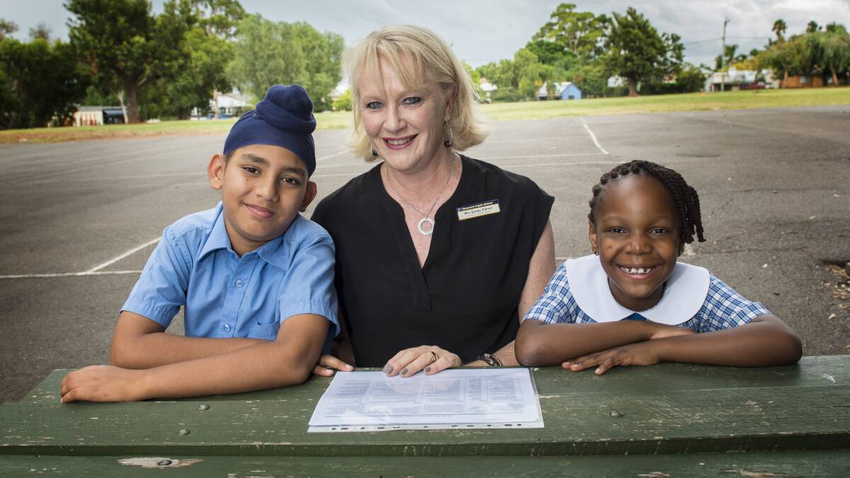 DIVERSITY: Harjot Singh with teacher Sandy Palmer and Treasure Nnorom are two of many students who identify English as a second language. Photo: Peter Hardin.