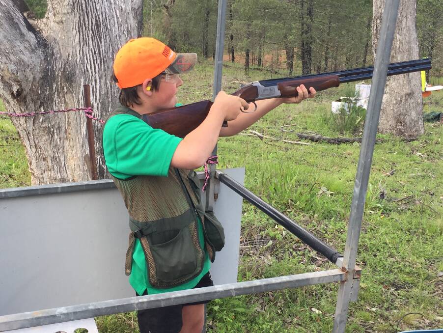 FOCUS: Local shooter Ethan Kelly lines up the target on Saturday during the Gum Tree Shoot at Gunnedah Sporting Clays.