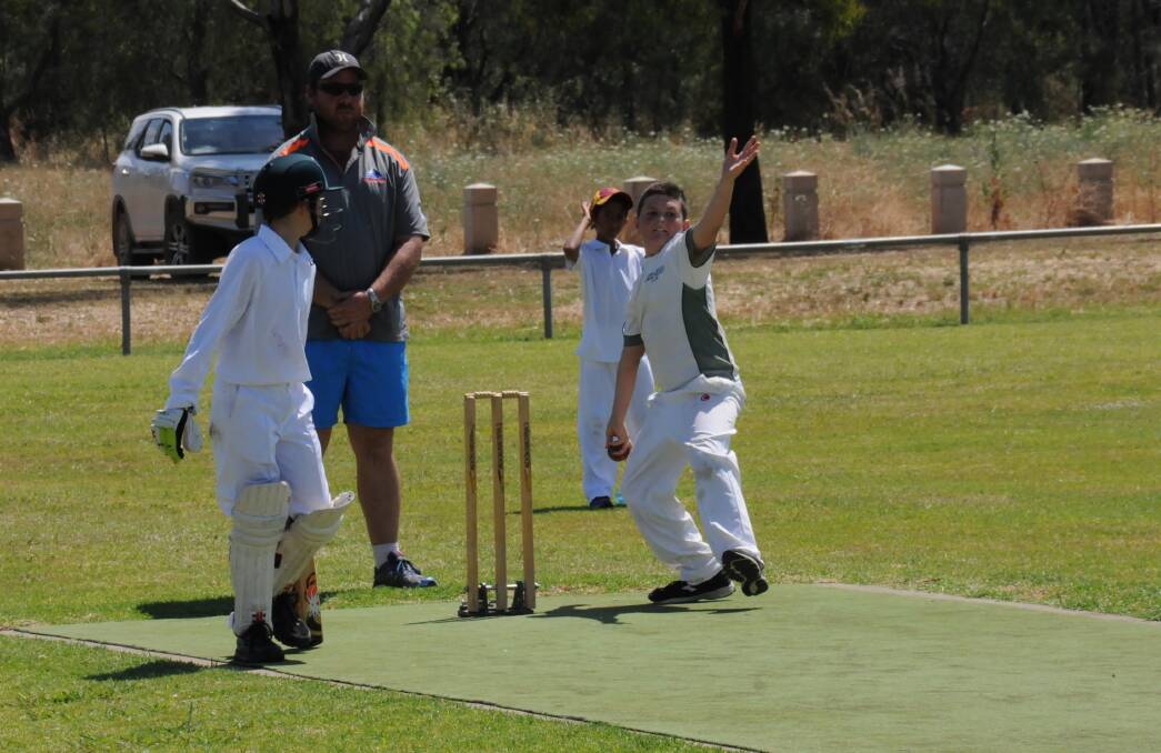 SHOWING HIS STYLE: Charlie Garner about to send down a delivery for Daracon against Fourways in Gunnedah under 12 cricket.