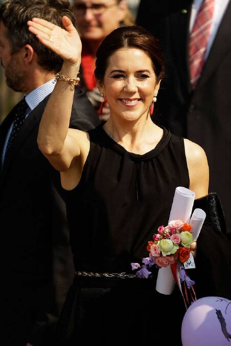Princess Mary of Denmark waves to a crowd of onlookers after attending the Premier's Reading Challenge at Five Dock Public School. Photo: Brendon Thorne