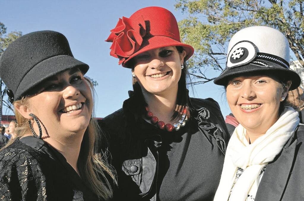 CATCHING up at the races, from left, Makishia Felton, of Manilla, Karly Brogan, of Attunga and Sally Laurie, of Manilla.