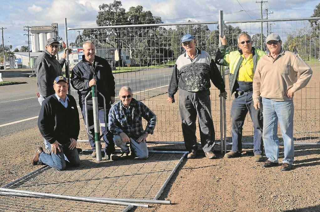 LIONS Club members are pleased to finally make a start on the long-awaited rest area for travellers by erecting protective fencing on the site last week. Pictured are Bob Carter, left, Marty Gurney, Stuart Muddle, Reg MacKay and Reg Mathew. Front: Paul Hope and Nev Steele.