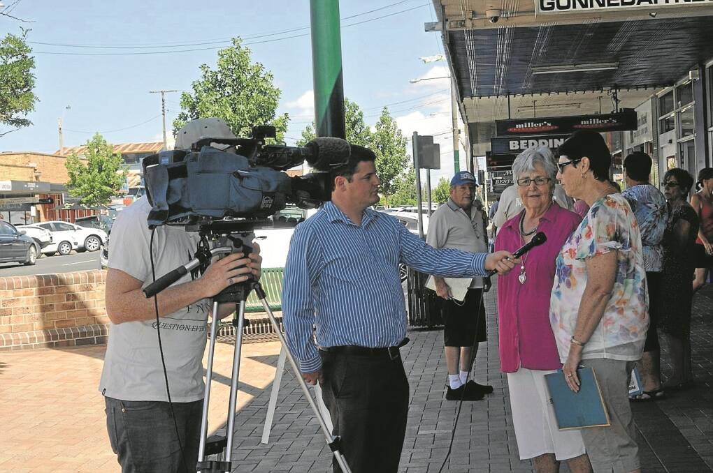 NBN’S Nick Hornby-Howell interviews Kay Wise and Heather Pasterski in Conadilly Street last Saturday as they colected signatures on a petition rejecting any move by Gunnedah Shire Council to relocate the Visitor Infromation Centre from ANZAC Park.