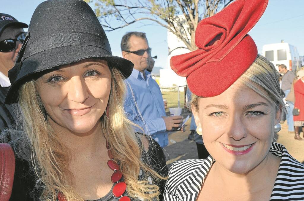 WINTER hats and fascinators were a must for Wean. Pictured from left, Pip Swain, of Carinda and Alisha Reading, of Gunnedah.