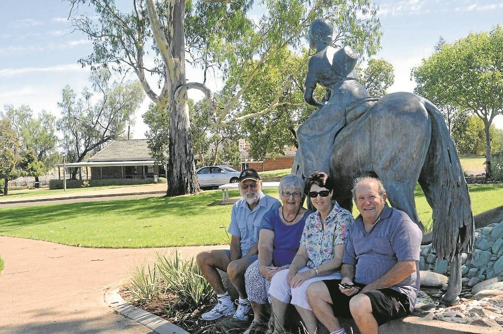 Jim and Kay Wise, left, and Heather and Don Pasterski, are appealing to Gunnedah residents to support their petition, objecting to a proposal to move the Visitor Information Centre away from its current location in ANZAC Park, opposite the Dorothea Mackellar Memorial.