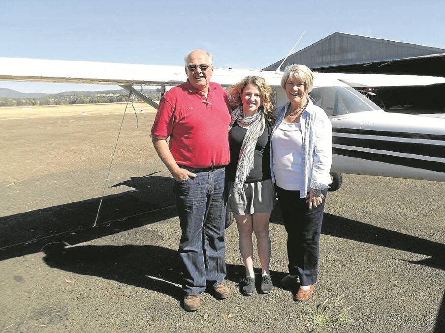 PETER and Judy Middlebrook, pictured with Kayla Smith, the first female to win the Chris Middlebrook Flying Scholarship.