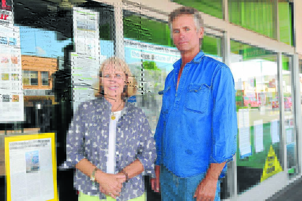 Mullaley farmer, Robyn King, left, and Willala landholder Alistair Donaldson outside the Conadilly Street shop front, next door to Santos.