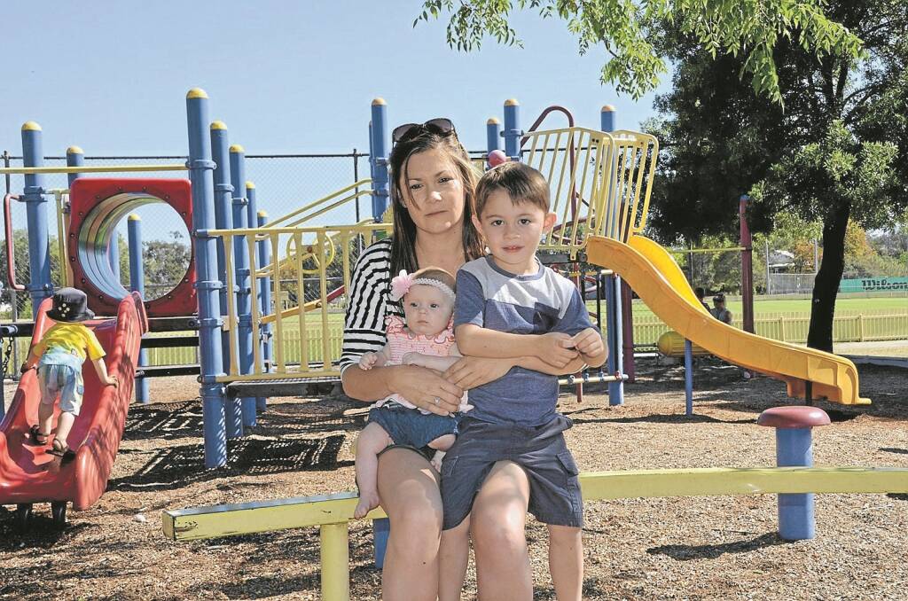 GUNNEDAH mum Ashley Bender, with children Kyren (3) and Azaylia (three months), wishes visiting the local playground was easier for her family.