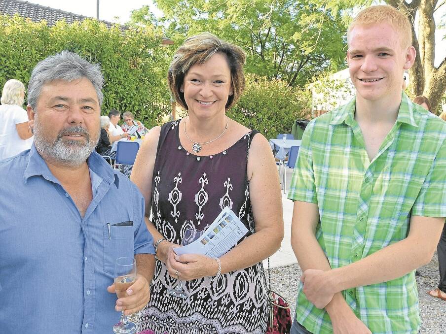 Kasey Sealy with local artist Helen Stanley and her son David.