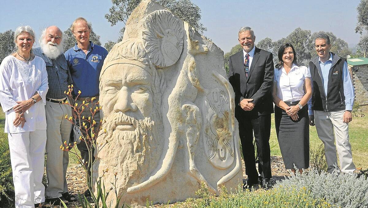 PICTURED at the official opening of the Heritage Sculptures on Pensioners Hill are sculptors Joan Relke and Carl Merten, left, Rotary Club of Gunnedah West President, Kel Walls, Gunnedah Mayor Owen Hasler and BHP Billiton Caroona Coal Project representatives, Tania McShane (Community Relations Co-ordinator) and Andrew Garratt (Manager External Affairs). 