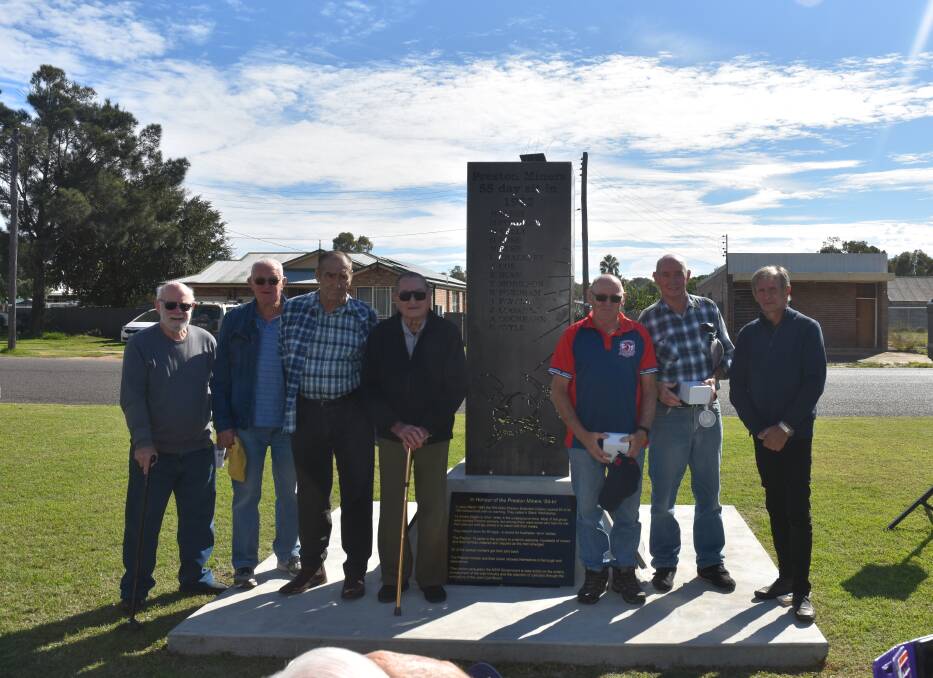 PLAQUE: Seven of the 16 coal miners who participated in the sit-in attended the unveiling. Photo: Owen Hasler
