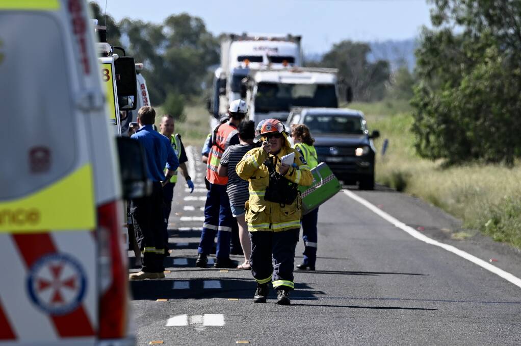 Emergency services remain at the scene of the crash on the Oxley Highway near Bective. Pictures by Gareth Gardner